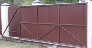 Купить откатные ворота из профнастила Великий Устюг, цена от 1766 руб.