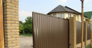 Купить откатные ворота из профнастила Великий Устюг, цена от 1766 руб.